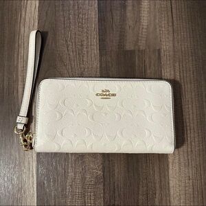 Coach Cream Wristlet with Textured Finish